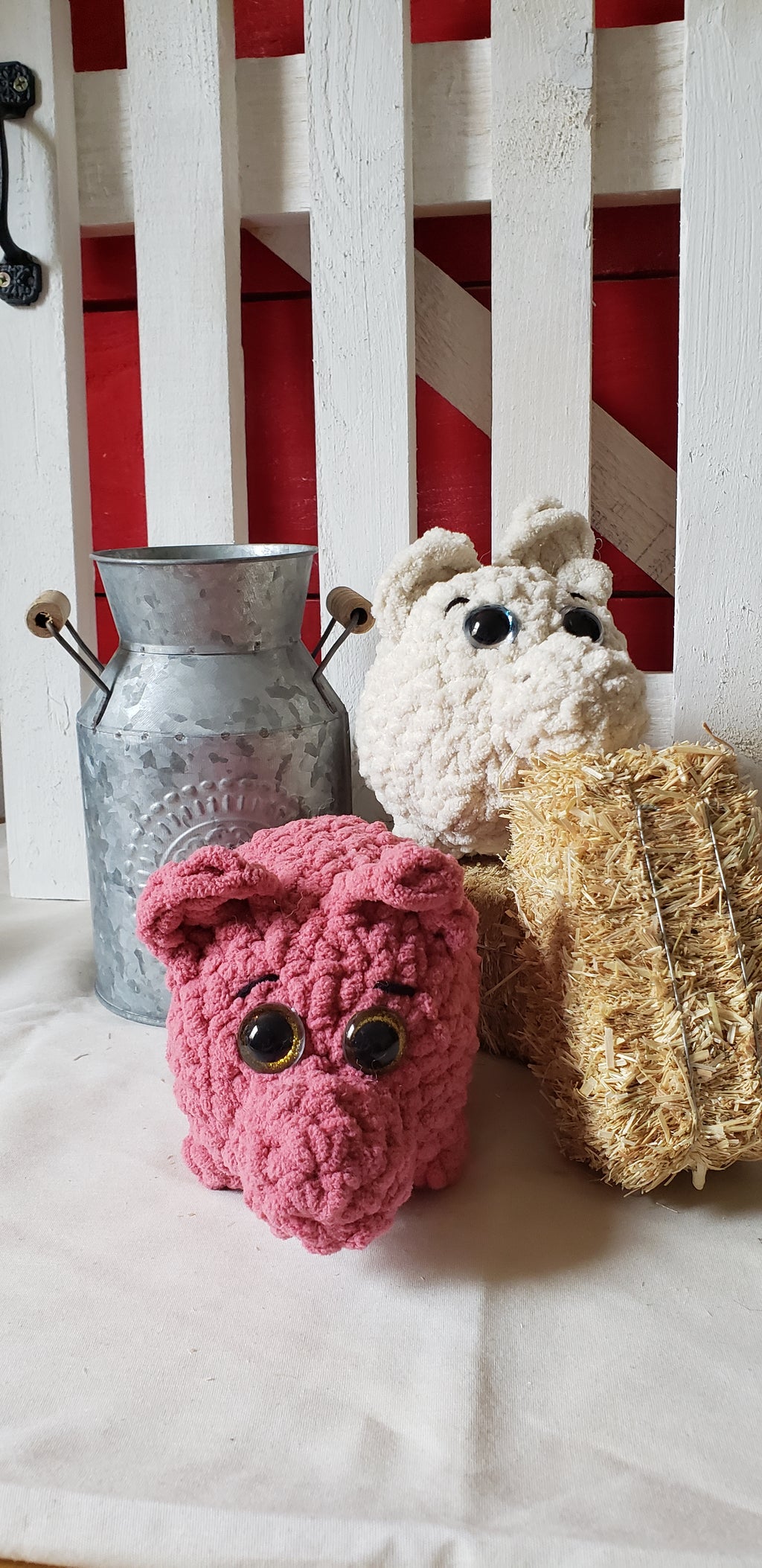 Pink and almond crocheted mini pig plushies together