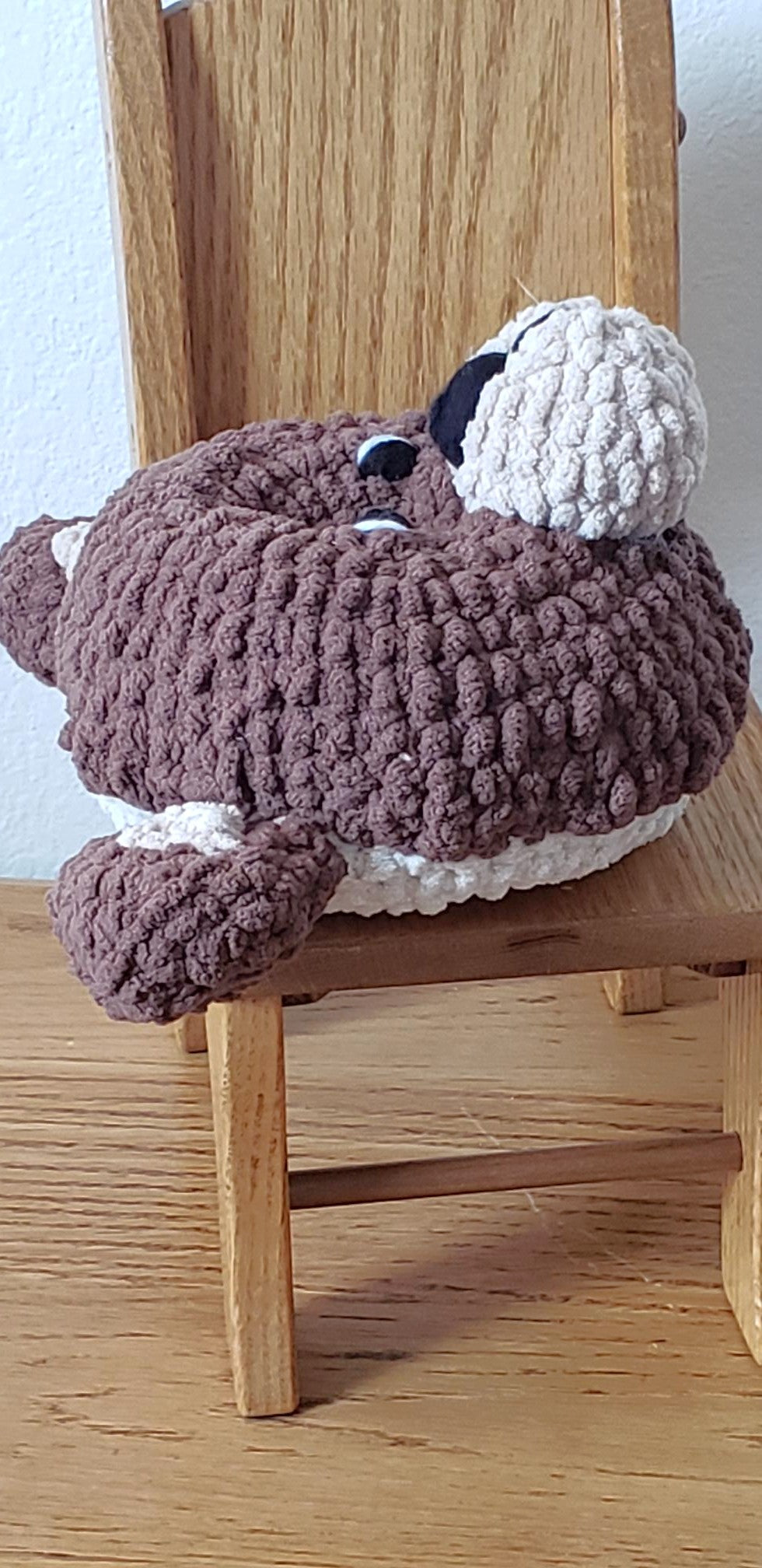Crochet teddy bear donut plushie - profile view